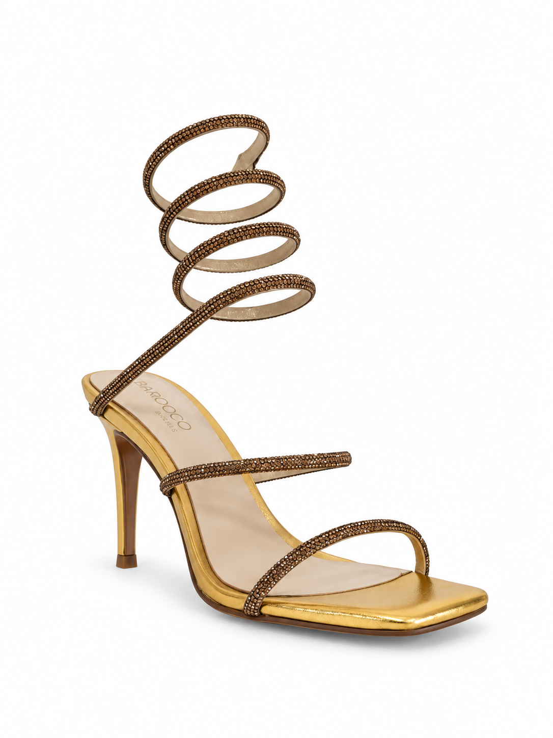 Gold leather heeled sandals with open toe, stiletto heel, embellished spiral ankle strap.