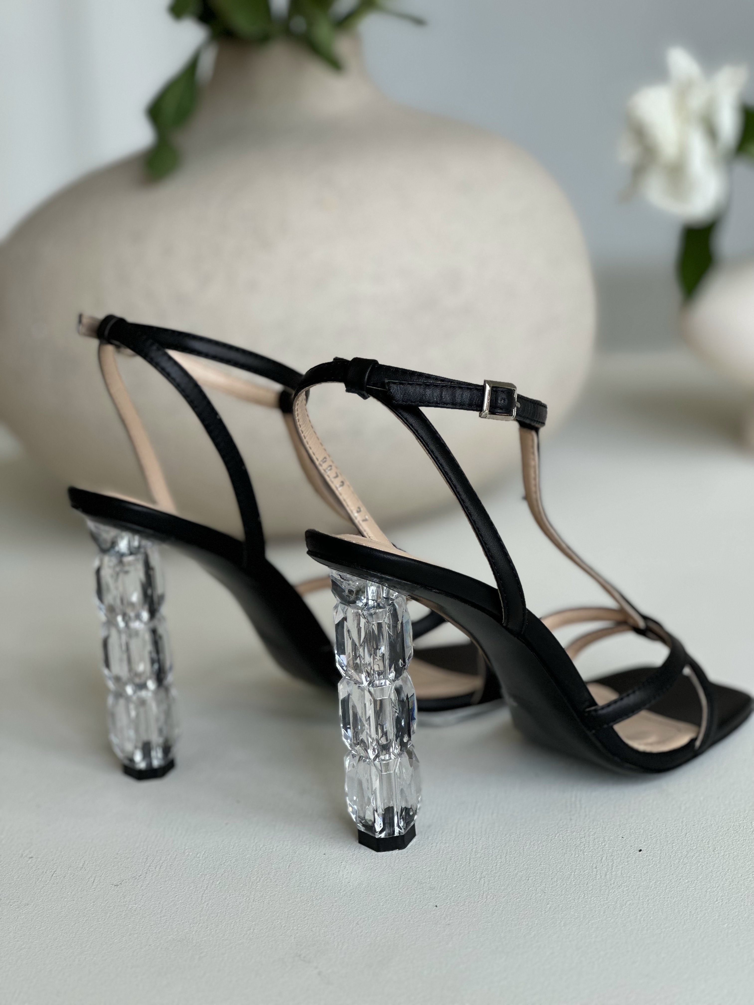 Black strappy sandals with crystal block heels, elegant women's footwear