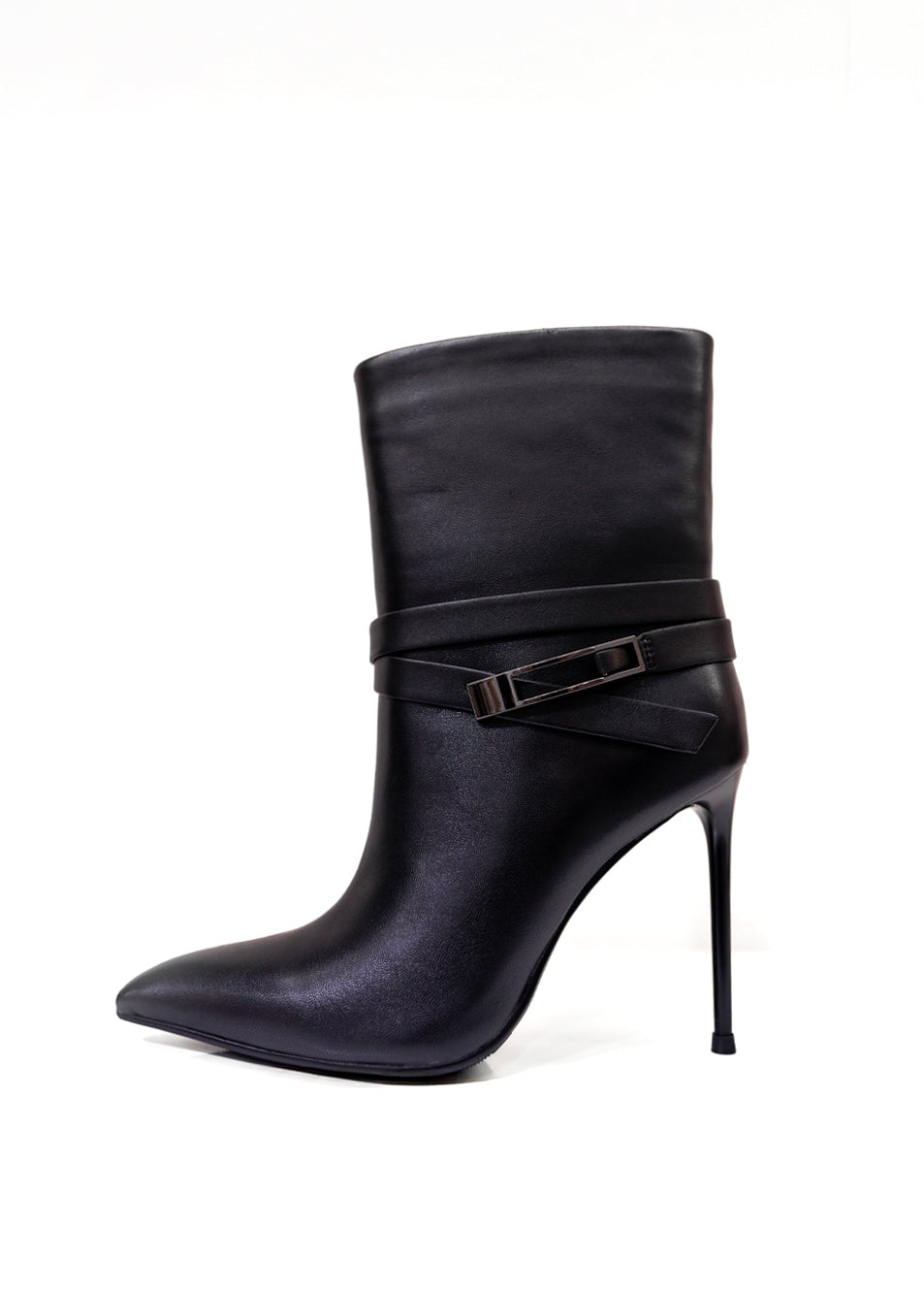 A black leather ankle boot with a pointed toe, high stiletto heel, and a decorative strap with a metallic buckle around the ankle, shown against a plain white background.